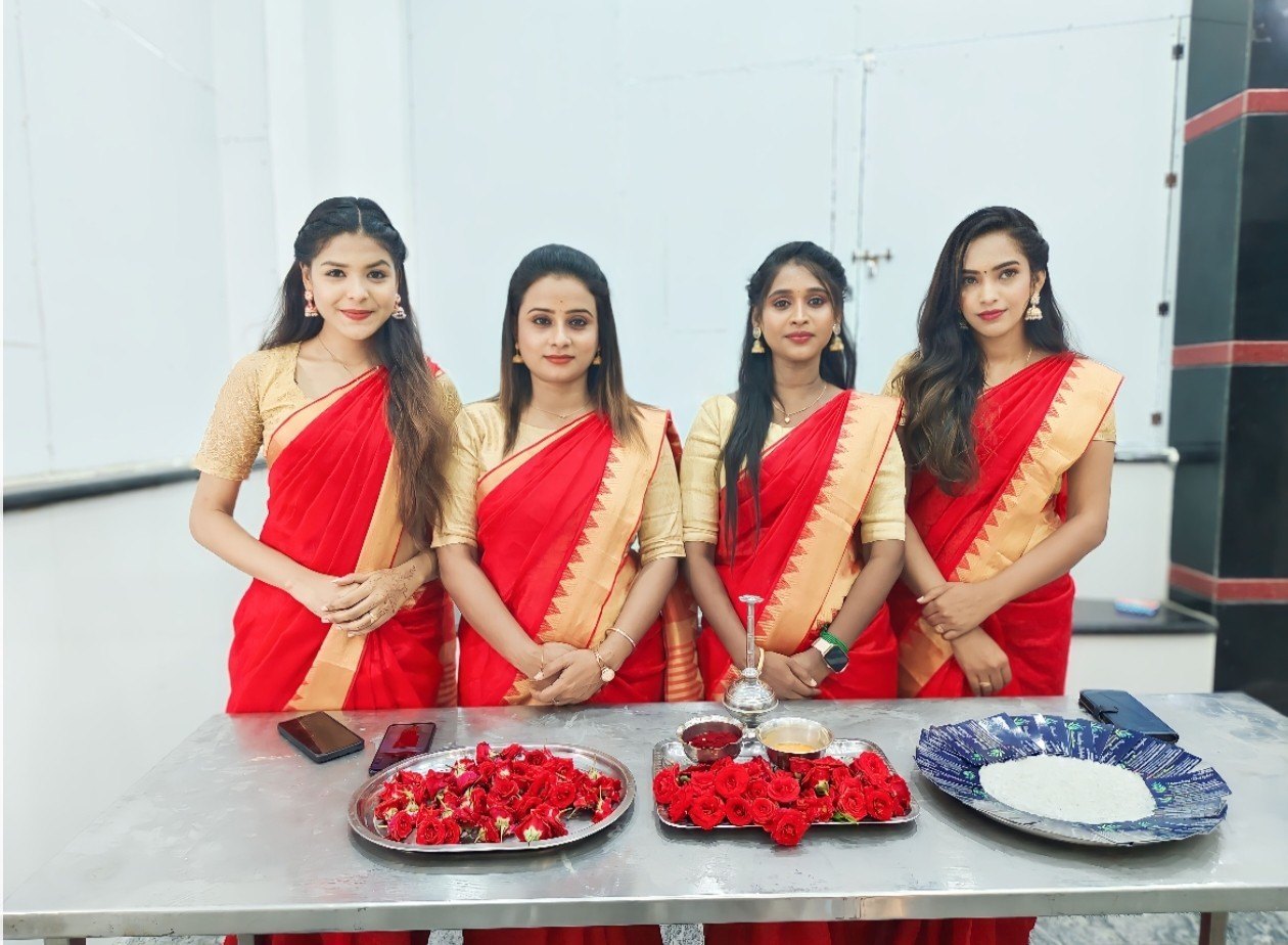 Group of bridesmaids in traditional sarees.